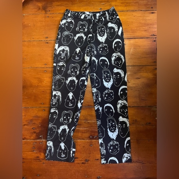 Urban Outfitters Shekou X-Small black pants with white faces EUC silky material - Picture 2 of 10